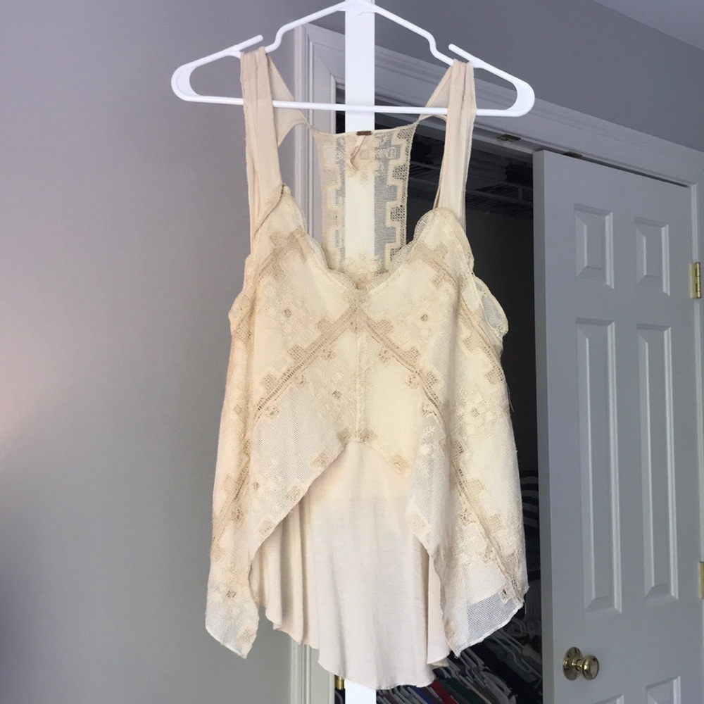 Cream color blouse from Free People.